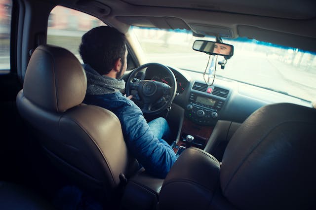 A man driving.