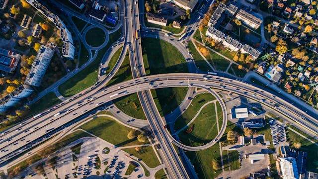 An aerial photo of a city with roads.